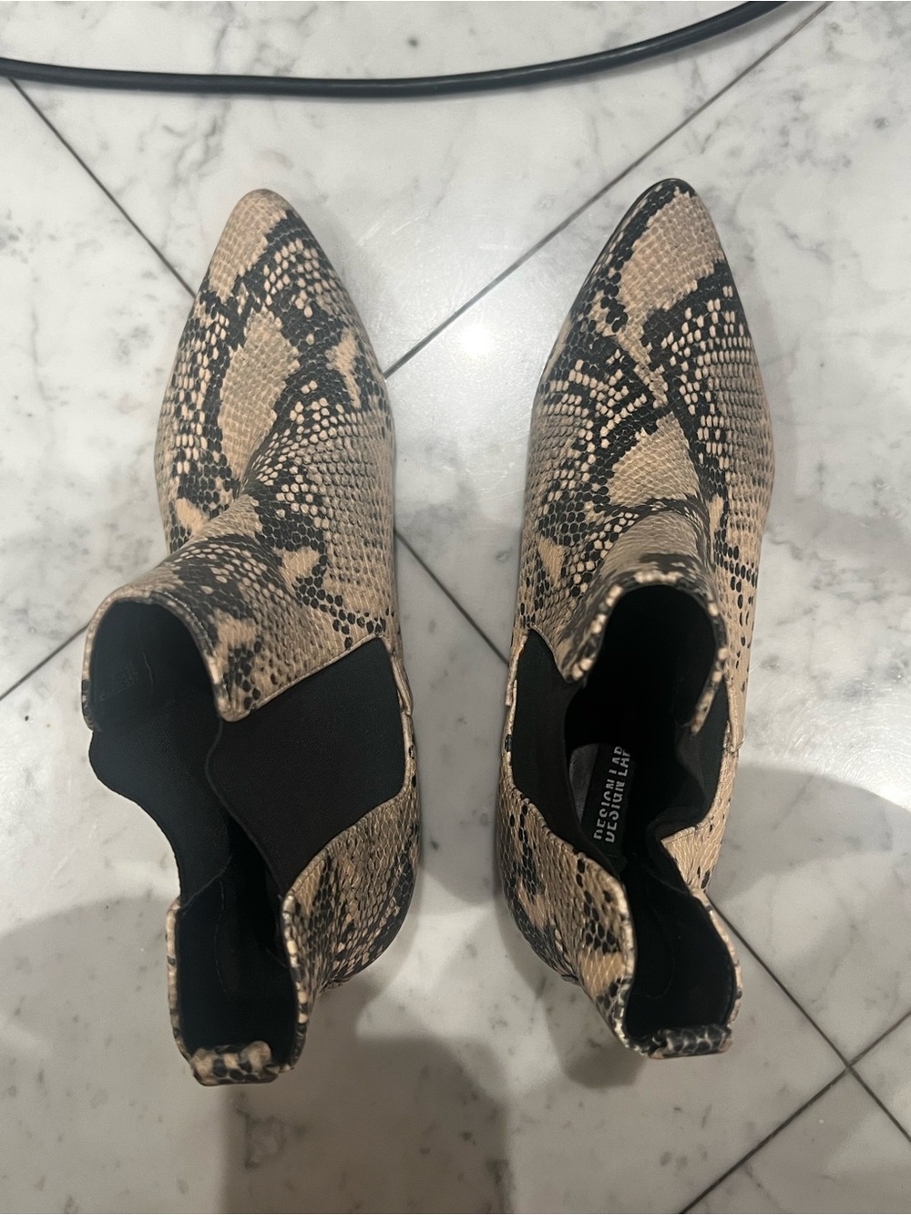 Snake-Print Pointed Chelsea Booties in Beige and Black